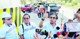 Public Works Secretary Vince Dizon addresses the media during his inspection of the Buhang flyover in Jaro, Iloilo City, ordering an accelerated repair timeline and targeting its reopening by April 30, 2026 to ease the burden on motorists amid rising fuel costs. PHOTOS BY HAZEL JOY FORTIN, UA INTERN