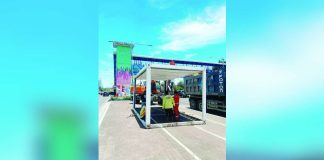 HEAT RELIEF HUB. Workers set up an air-conditioned cooling center along Diversion Road in Mandurriao, Iloilo City. The city government will enforce time limits to ensure more residents can access temporary shelter from extreme heat. MAI LADIAO/PN