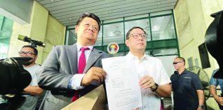 Atty. Manases “Mans” Carpio (right), husband of Vice President Sara Duterte-Carpio, arrives at the Quezon City Prosecutor’s Office with his lawyer to file charges against top financial regulators and several members of the House Committee on Justice. PHOTO COURTESY OF JASON RUBLICO/SMNI