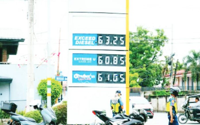 Negros Island Region’s inflation in March 2026 was mainly driven by housing, water, electricity, gas, and other fuels, which jumped to 8.2 percent from -1.0 percent in February. Photo shows police personnel joining the monitoring of fuel prices conducted by the Bacolod City Government on March 9, 2026. BACOLOD CITY COMMUNICATIONS OFFICE PHOTO