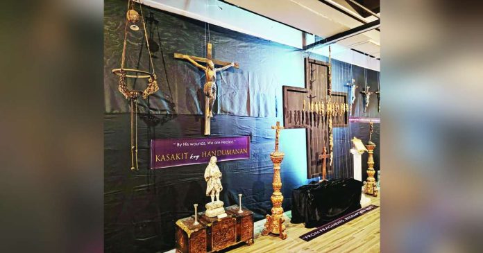 neljoy USA Lent Exhibit_superimposed SCARS OF FAITH. Weathered crucifixes and fragmented religious sculptures form part of the “Kasakit kag Handumanan sa Kuwaresma” exhibit at the University of San Agustin Archives and Museum, where centuries-old artifacts — marked by time and devotion — are presented not as damaged relics, but as enduring symbols of faith, memory, and sacrifice beyond the Lenten season. NELJOY GALIGAO/PN