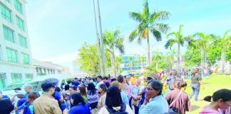 Employees and visitors evacuate the Iloilo Provincial Capitol following a magnitude 4.3 earthquake that struck Iloilo and Guimaras on April 15, prompting precautionary safety measures. ISAH GONZAGA DAVID/ISAT-U INTERN