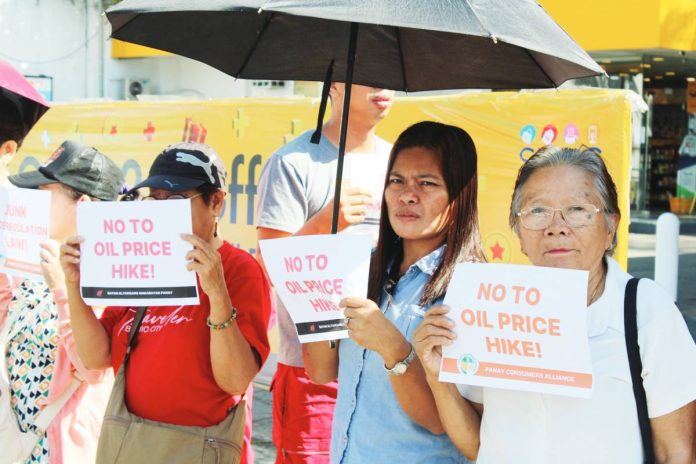 neljoy strike PROTEST VS FUEL HIKE. Members of the No to Oil Price Hike Coalition and allied transport groups stage a demonstration in Iloilo City, calling on the government to take urgent action against the continuing surge in fuel prices that is straining the livelihood of drivers and burdening commuters. AJ PALCULLO/PN