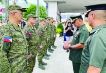 Defensor, other Iloilo prov’l officials join Army reserve after completing training Formally joining the Philippine Army Reserve, Iloilo’s Gov. Arthur Defensor Jr. (second from left) and other provincial officials (Provincial Administrator Raul Banias, Provincial Population Office head Atty. Ruel Von Superio, Atty. Artem Ron Raymundo, Charles Lemeric, Leobert Pinuela, and Gerry Mae Alcoriza) receive their certificates and serial numbers during a flag-raising ceremony at the Iloilo Provincial Capitol after completing their training.