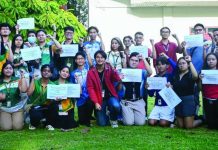 Panayanon youth leaders from various universities raise clenched fists and hold placards during a solidarity gathering, declaring support for transport workers and calling for government reforms amid the escalating fuel crisis. PHOTO BY FORUM DIMENSIONS