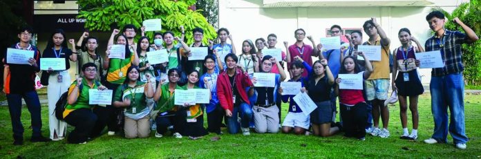 neljoy_youth_unite_copy_compressed_resized Panayanon youth leaders from various universities raise clenched fists and hold placards during a solidarity gathering, declaring support for transport workers and calling for government reforms amid the escalating fuel crisis. PHOTO BY FORUM DIMENSIONS
