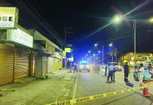Police cordoned the area where two women were shot by a lone gunman along the roadside in Barangay Ungka 1, Pavia, Iloilo Tuesday night, April 14, 2026. According to the Pavia police station, one victim died while the other remained in critical condition. LYNDIE C. DEFACTO/PN