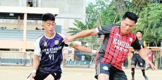 Harold Bayona of Barotac Nuevo controls the ball against the defense of Jovanie Simpron from Sta. Barbara, Iloilo. CONTRIBUTED PHOTO