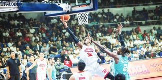 Barangay Ginebra San Miguel Kings' Justin Brownlee attempts a tough layup while being defended by Phoenix Super LPG Fuel Masters' James Dickey III. PBA PHOTO