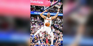 Bruce Brown of the Denver Nuggets roars after dunking during the fourth quarter of the Nuggets’ 116-105 win over the Minnesota Timberwolves. PHOTO BY AARON ONTIVEROZ/THE DENVER POST