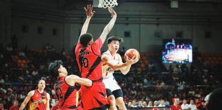 Rain or Shine Elasto Painters’ Adrian Nocum attempts a tough shot against San Miguel Beermen import Justin Patton. PBA PHOTO