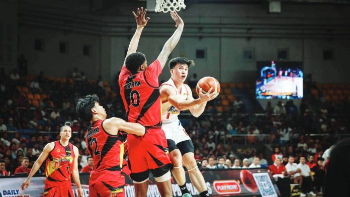 sports Nocum Rain or Shine Elasto Painters’ Adrian Nocum attempts a tough shot against San Miguel Beermen import Justin Patton. PBA PHOTO