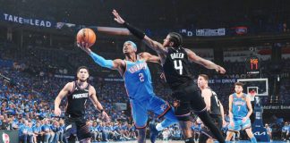 Oklahoma City Thunder guard Shai Gilgeous-Alexander goes for a tough shot against the defense of Filipino-American guard Jalen Green of Phoenix Suns. GETTY IMAGES