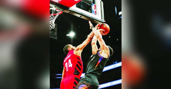 Portland Trail Blazers guard Kris Murray foils the shot attempt of Phoenix Suns star Devin Booker. PHOTO COURTESY OF PORTLAND TRAIL BLAZERS' FACEBOOK PAGE