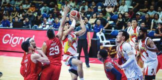 San Miguel Beermen guard Celedonio Trollano goes for a layup against the defense of Barangay Ginebra San Miguel Kings’ Norbert Torres. PBA PHOTO