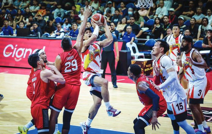 sports Trollano San Miguel Beermen guard Celedonio Trollano goes for a layup against the defense of Barangay Ginebra San Miguel Kings’ Norbert Torres. PBA PHOTO
