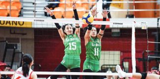 Ilongga Amie Provido and Shane Reterta of De La Salle University Lady Spikers block an attack from University of the East Lady Warriors. UAAP PHOTO