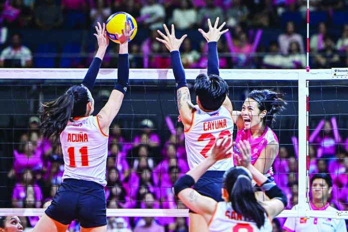 sports_Cream_compressed_resized Creamline Cool Smashers’ Jema Galanza attacks against the defense of Cignal Super Spikers. PVL PHOTO