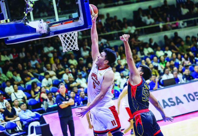 sports_Ginebra_copy_compressed_resized Barangay Ginebra San Miguel Kings center George Isaac Go soars for a dunk. PBA PHOTO