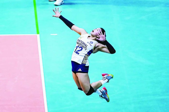 sports_NU.JPG_resized_resized_compressed National University Lady Bulldogs’ Sam Cantada soars for a powerful serve. UAAP PHOTO