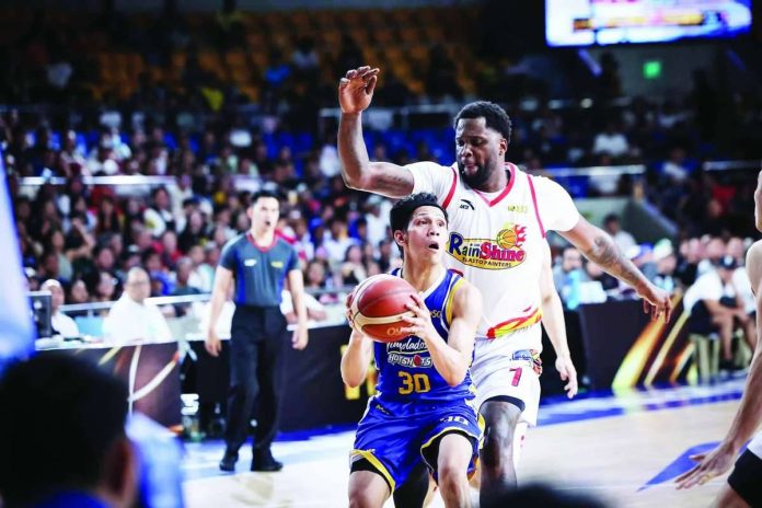 sports_Painters_compressed_resized Rain or Shine Elasto Painters’ Jaylen Johnson defends Magnolia Chicken Timplados Hotshots' Jerom Lastimosa. PBA PHOTO