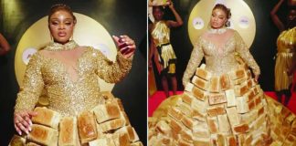 Africa’s reality TV star Queen Mercy Atang is seen with her dress made from loaves of bread. BBC/GIFT UFUOMA