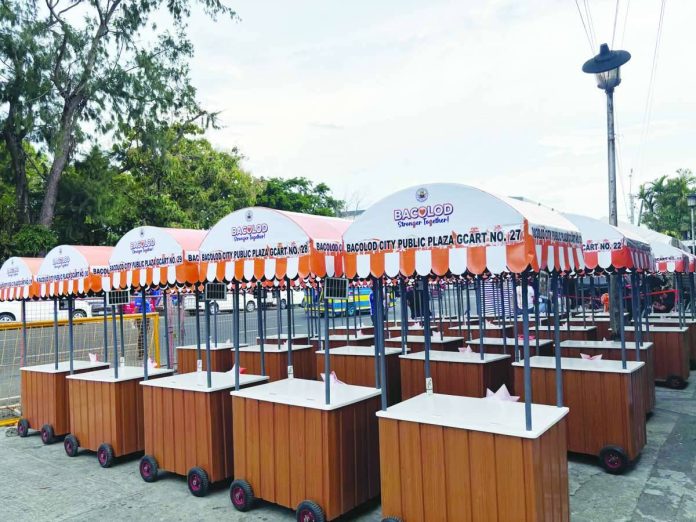 Bacolod_gcarts_copy_compressed_resized The 31 G-Carts distributed free of charge by the Bacolod City Government to members of the Bacolod City Plaza Vendors Association as part of the city’s support program for plaza vendors amid the rehabilitation of the Bacolod Public Plaza. MAE SINGUAY/PN