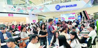 Job seekers crowded the main atrium of SM City Bacolod on May 1, 2026, as they explored employment opportunities during the Labor Day job fair organized by DOLE-NIR and the Bacolod City Government. MAE SINGUAY/PN
