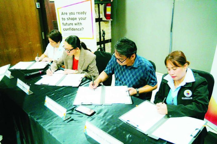 The Bacolod City Government and SyCip Gorres Velayo & Co. (SGV) formalized their partnership through a contract signing on May 14 at L’Fisher Hotel in Bacolod City. In photo (from left) are Djole Garcia, Katrina Francisco, Mayor Greg Gasataya, and Bacolod Environment and Natural Resources Office Officer-in-Charge Atty. Allyn Luv Dignadice. BCCO-PIO PHOTO