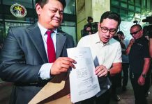 Sara hubby claims ‘bank glitch’ for disputed P2-B transaction Lawyer Manases “Mans” Carpio (right), husband of Vice President Sara Duterte-Carpio, appears before the Quezon City Prosecutor’s Office on April 27, 2026 with his counsel, Peter Paul Danao, to file a complaint against officials of the Bangko Sentral ng Pilipinas, the Anti-Money Laundering Council, and House lawmakers over disclosures on his finances during hearings related to the impeachment of his wife. PHOTO BY GRIG C. MONTEGRANDE | INQUIRER