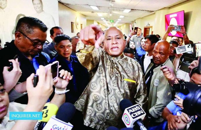Bato_escapes_compressed_resized Sen. Ronald “Bato” Dela Rosa was last seen Wednesday night with members of his staff after emerging from the office of Senate President Alan Peter Cayetano amid mounting tension inside the Senate. Earlier in the day, he held a press conference appealing for support from Philippine Military Academy alumni. PHILIPPINE DAILY INQUIRER
