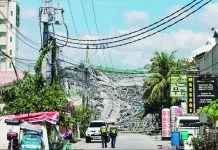 Collapsed building previously shut down over safety violations Police authorities cordon off the area surrounding a collapsed nine-story building in Barangay Balibago, Angeles City, Pampanga, on Sunday, May 24, 2026. While rescue workers have successfully pulled more than 20 individuals from the rubble, search and rescue efforts remain underway during the critical hours following the disaster, with an estimated 30 to 40 people still believed to be trapped. INQUIRER PHOTO / GRIG C. MONTEGRANDE