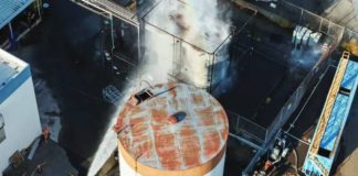 Drone footage shows water being sprayed on a tank as authorities rush to contain a chemical incident in Garden Grove, California, USA. REUTERS