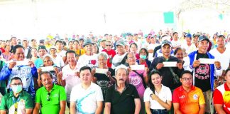 Farmers from Dao, Cuartero, and Dumarao in Capiz received indemnity checks from the Philippine Crop Insurance Corporation during the distribution of assistance under the Calamity Crop Insurance Project at the Cuartero Civic Center on May 19, 2026. The program provides financial relief to farmers affected by recent natural calamities. CAPIZ PROV’L GOV’T COMMUNICATIONS GROUP PHOTO