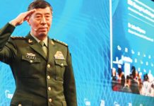 China announces suspended death sentences for ex-defense ministers Li Shangfu salutes the audience before delivering a speech during the 20th Shangri-La Dialogue summit in Singapore on June 4, 2023. Li Shangfu served as China defense minister from March to October 2023. AFP VIA GETTY IMAGES