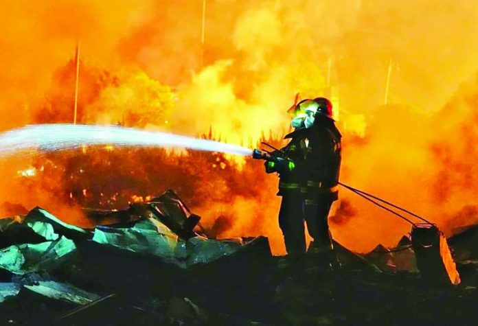 China_copy_compressed_resized Firemen battle a huge fire following a fatal explosion at a fireworks factory in Hunan, China. BBC