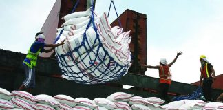 Imported rice from Thailand unloaded at Harbor Center in Tondo, Manila. President Ferdinand “Bongbong” Marcos Jr. last week mandated a price ceiling of P50 per kilogram on imported rice nationwide. DANNY PATA/FILE / GMA NEWS