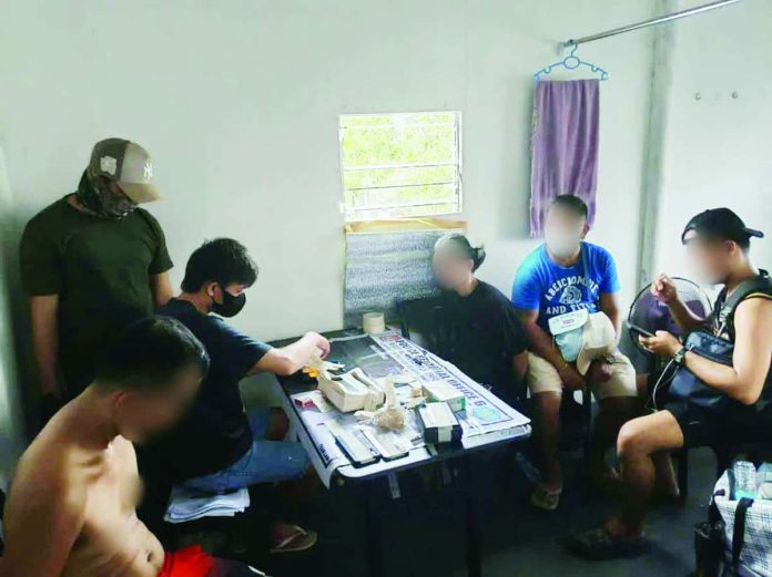 Police operatives arrested two high-value individuals and confiscated sachets of suspected shabu during a buy-bust operation in Barangay Sinikway, Lapuz, Iloilo City on May 20, 2026. Authorities seized around 230 grams of suspected shabu worth P1.564 million along with buy-bust money and drug paraphernalia. RPDEU 6 PHOTO