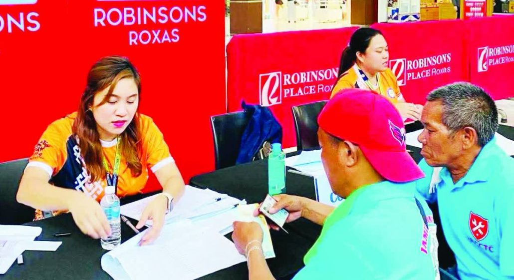 Public utility drivers in Capiz receive fuel cash subsidies from the Land Transportation Franchising and Regulatory Board during the first batch of payouts in Roxas City on May 7, 2026, as the agency continues distributing government assistance to help cushion the impact of rising fuel prices on the transport sector.