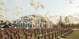 Balloons fly as soldiers stand in position next to memorial stones during the opening ceremony of the Memorial Museum of Combat Feats at the Overseas Military Operations honoring North Korean troops killed while fighting for Russia in the war against Ukraine, in Pyongyang, North Korea. KCNA VIA REUTERS