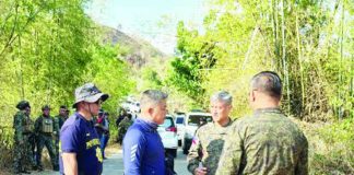 Brig. Gen. Jason Jumawan (second from right), commander of the Philippine Army’s 302nd Infantry Brigade, inspected the area near the encounter site in Barangay Abaca, Cauayan, Negros Occidental on May 17, 2026. Five remnants of the New People’s Army were killed in a clash with troops from the 15th Infantry Battalion on May 16. PHOTO COURTESY OF CHENG SANTILLAN / PNA