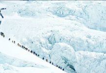 Record 274 climbers scale Everest via Nepal in one day Climbers walk in a long queue as they head to summit Mount Everest in the Solukhumbu district, Nepal. Tourism to the world's tallest mountain has surged despite a mark-up in permit fees. REUTERS