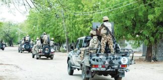 Nigerian soldiers from the Multinational Joint Task Force drive around in pick-ups during training at the MNJTF military base, Sector 3 Headquarters, in Monguno, Borno state, Nigeria. The Nigerian military has increased cooperation with the United States in efforts to combat extremist violence. AFP VIA GETTY IMAGES