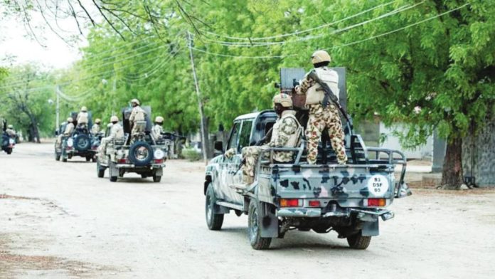Nigeria Nigerian soldiers from the Multinational Joint Task Force drive around in pick-ups during training at the MNJTF military base, Sector 3 Headquarters, in Monguno, Borno state, Nigeria. The Nigerian military has increased cooperation with the United States in efforts to combat extremist violence. AFP VIA GETTY IMAGES