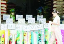 Various rice varieties are displayed at a retail store in San Andres, Manila on May 7, 2026. The Department of Agriculture on Thursday, May 14, 2026, assured the immediate implementation of a P50-per-kilo price cap on 5 percent broken imported rice. PNA PHOTO BY YANCY LIM