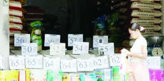 Various rice varieties are displayed at a retail store in San Andres, Manila on May 7, 2026. The Department of Agriculture on Thursday, May 14, 2026, assured the immediate implementation of a P50-per-kilo price cap on 5 percent broken imported rice. PNA PHOTO BY YANCY LIM