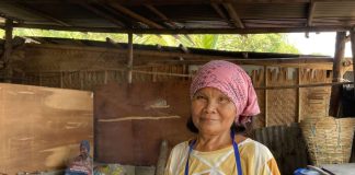 Sherley Padohinog holding the tultul salt finished product. She is the woman behind the traditional production of tultul salt in Barangay Hoskyn, Jordan, Guimaras.