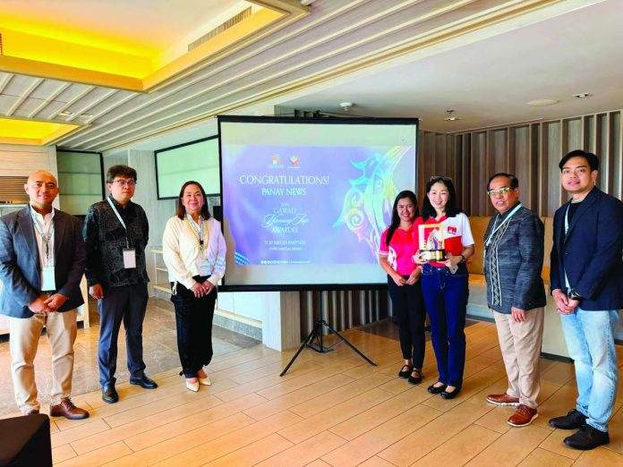 PN_award_compressed_resized Panay News’ Marketing Manager Leah Fajardo (third from right) and Associate Editor Darlene Delgado (fourth from right) receive the 2026 Top IP Provincial News Award from Intellectual Property Office of the Philippines’ Director General Teodoro C. Pascua (second from right), together with officials from the IPOPHL, in recognition of the publication’s exemplary coverage on intellectual property advocacy and innovation reporting in Western Visayas. MAI LADIAO/PN