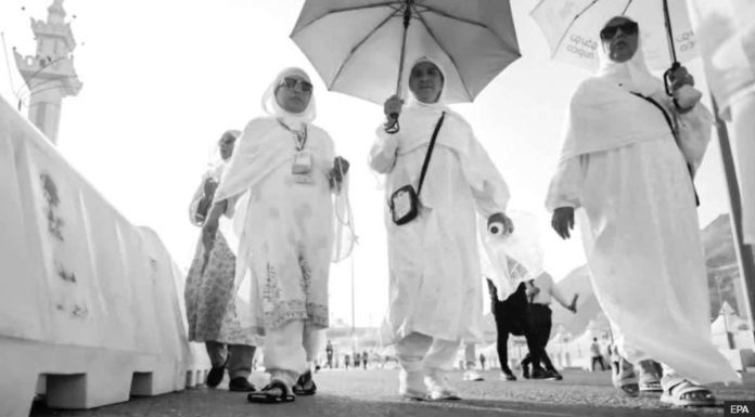 Saudi_compressed_resized Muslim pilgrims make their way to the Mina tent camp for the start of the Hajj pilgrimage in Mecca, Saudi Arabia. The pilgrims had to contend with high temperatures. EPA