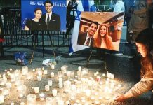 US to seek death penalty for suspect in killing of Israeli embassy staff members People attend a candlelight vigil for Yaron Lischinsky and Sarah Lynn Milgrim across from the White House in Washington, DC. AFP VIA GETTY IMAGES